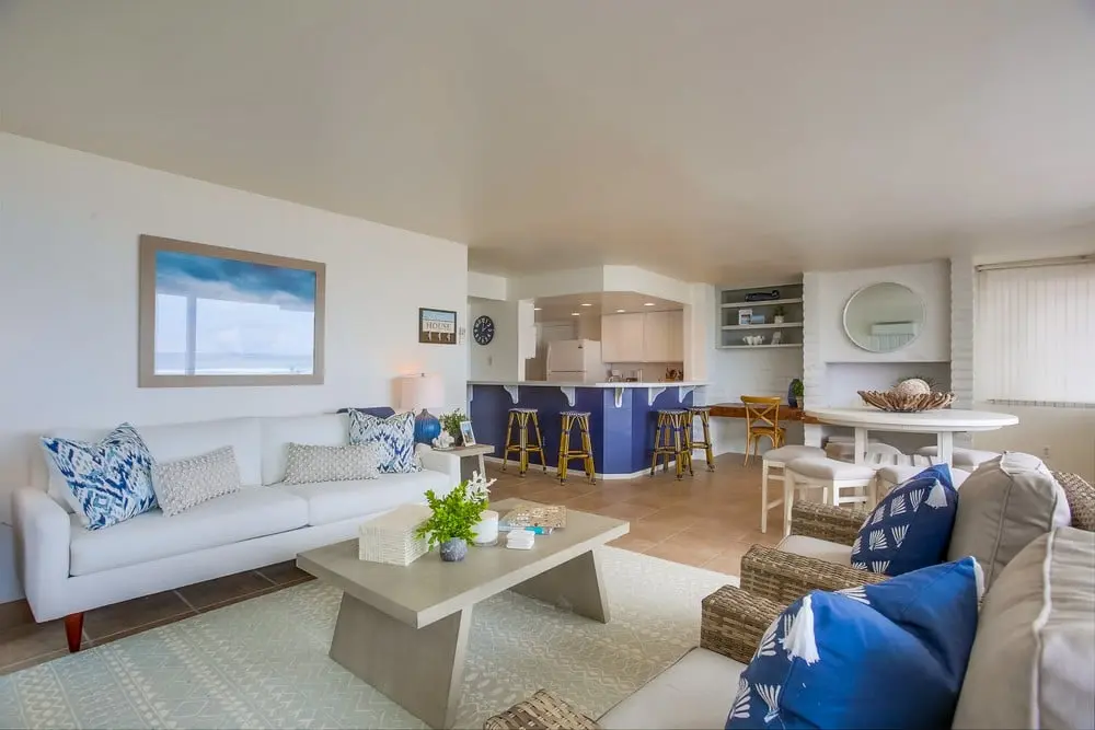 Ground-level living room with ocean views at Isurus Beach House